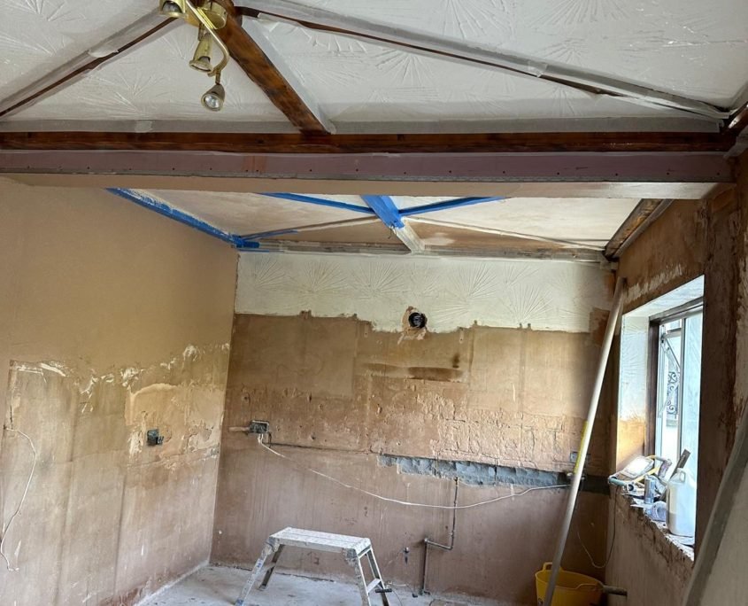 Barn Hill Kitchen After Wall has been Removed and the Beam Installed